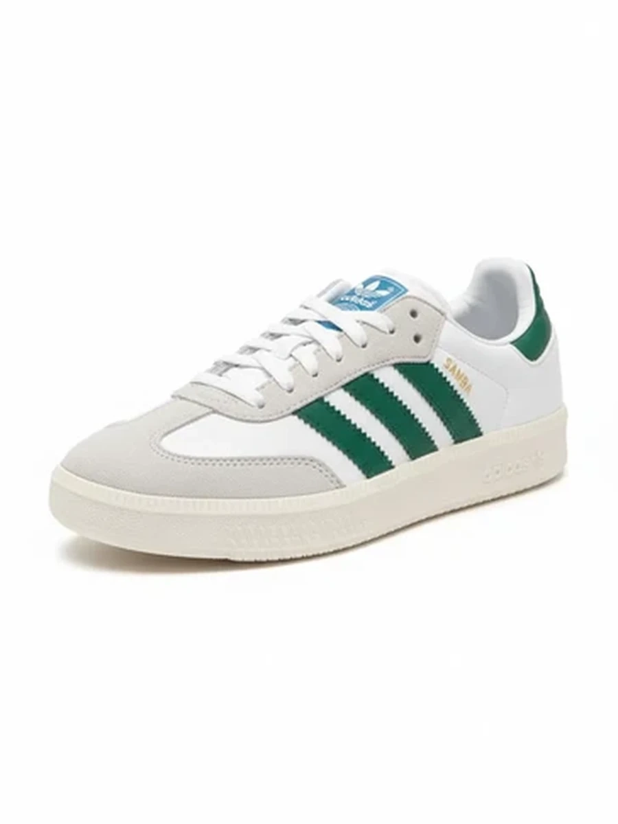 Женские Классические кроссовки Adidas белые с зелеными полосками для города
