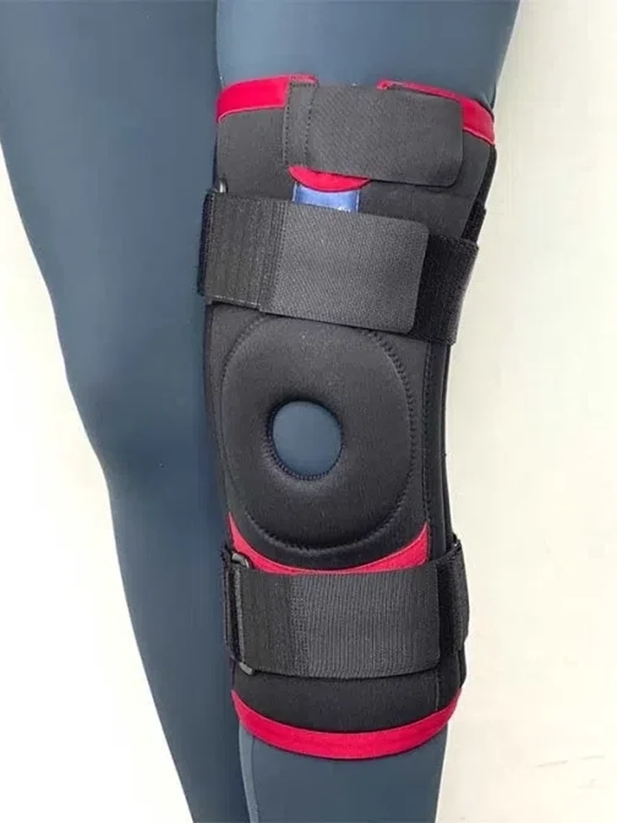 REF 103                                         Наколенник с отверстием для чашечки ,гибими боковыми  вставками  и фиксирующими  лентами. Неопрен.