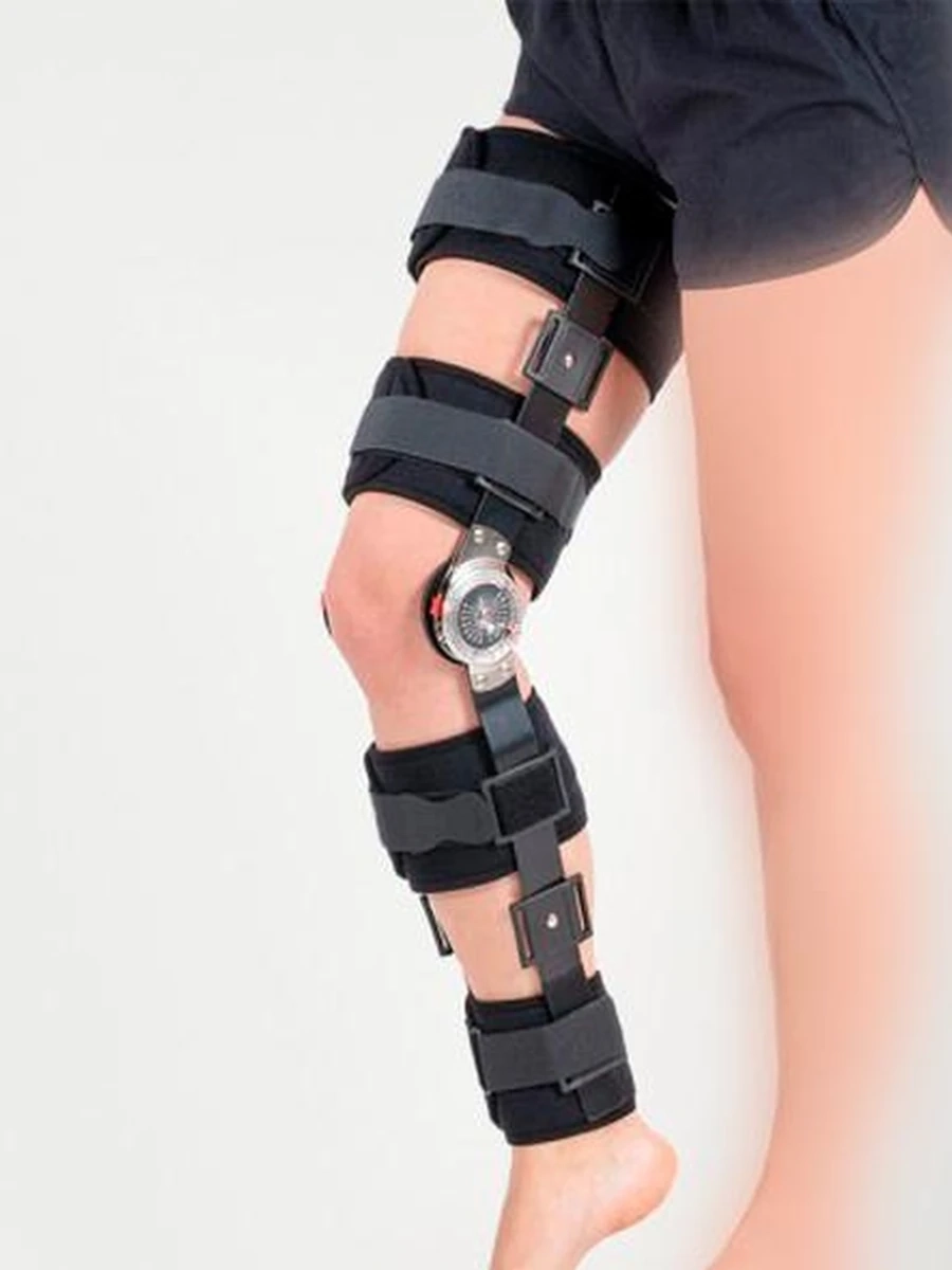 SL 09                                                     Бандаж для ноги шарнирный , с регулир. углом .